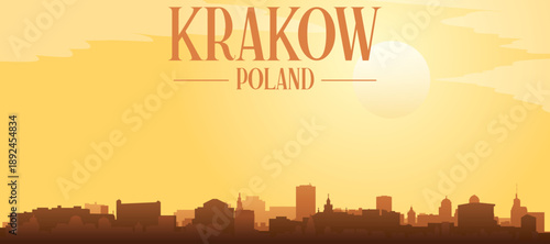 Golden yellow panoramic poster of the city skyline with misty background buildings and clouds of KRAKOW, POLAND