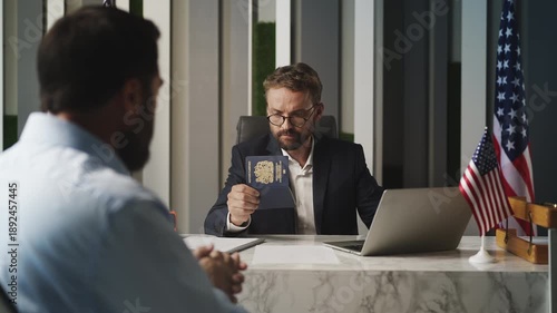 Wallpaper Mural Male U.S. embassy worker approving visa and handing U.K. passport to applicant Torontodigital.ca