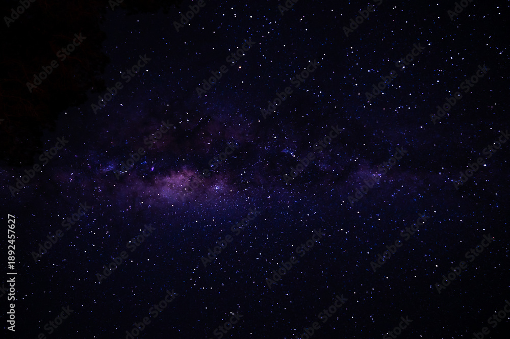 Obraz premium Nebula in a dark starry night sky