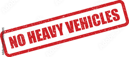 This grunge red rubber stamp clearly displays the important traffic warning NO HEAVY VEHICLES on white
