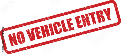 This striking red rubber stamp explicitly communicates NO VEHICLE ENTRY for restricted access areas
