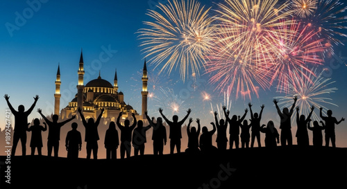Silhouette of people celebrating with fireworks and illuminated mosque at dusk festive atmosphere and joyful crowd in front of glowing building