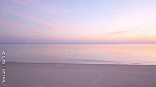 Serene Beach Landscape at Sunset with Calm Sea.