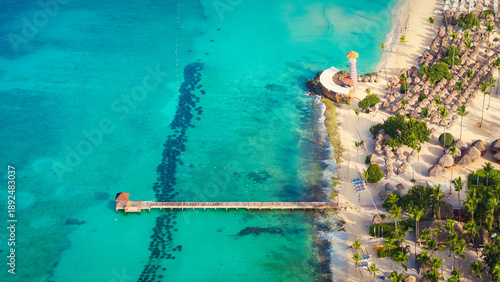 Wallpaper Mural Top view of a lighthouse and wooden pier on Bayahibe beach with Caribbean sea,exclusive resort, summer concept, La Romana , Dominican Republic Torontodigital.ca