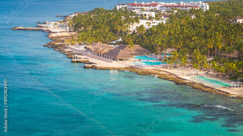 Wallpaper Mural Aerial view of a awesome sandy beach,palm tree, beach chair and Caribbean Sea,background exclusive resort, Bayahibe beach, Dominican Republic Torontodigital.ca