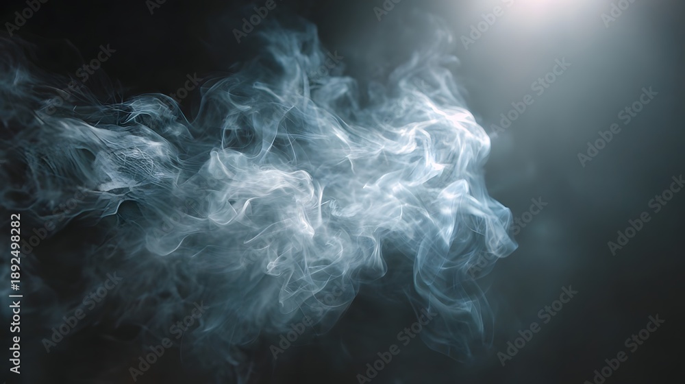 Obraz premium Abstract swirling smoke patterns illuminated by dramatic lighting against a dark background