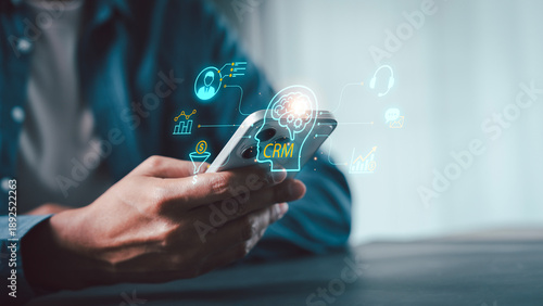 Photos Digital CRM Concept on Smartphone: Customer Relationship Management, AI, and Bus