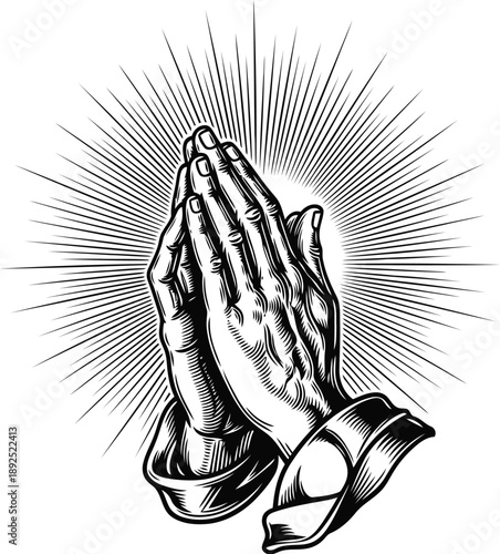 Praying hands with divine light