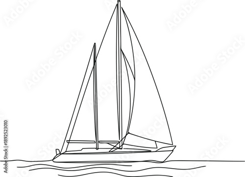 Sailboat sailing on calm waters with full sails