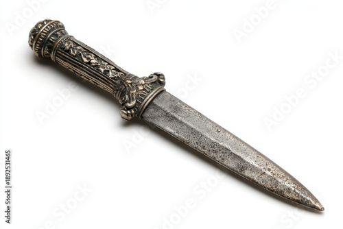 Vintage dagger with ornate handle and dark patina blade evokes dark academia aesthetic perfect for stationery or decorative display