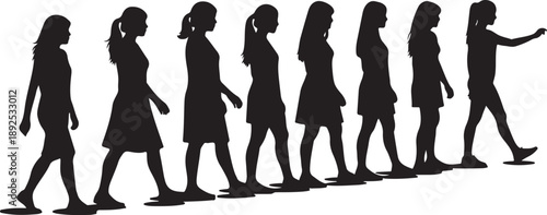 Silhouette of women walking in a line formation together