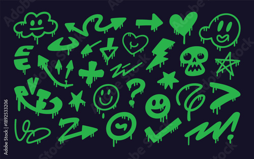Collection of neon green doodles including symbols and emoticons on a dark background viewed from directly above