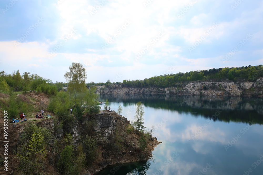 Fototapeta premium Zalew Zakrzówek - an artificial reservoir in Krakow in Zakrzówek. It was created in 1992 after the flooding of an old limestone quarry. It consists of two reservoirs, connected by an isthmus