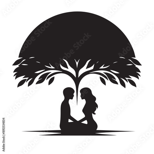 A loving couple's intimate moment shared under the shelter of a beautiful tree silhouette