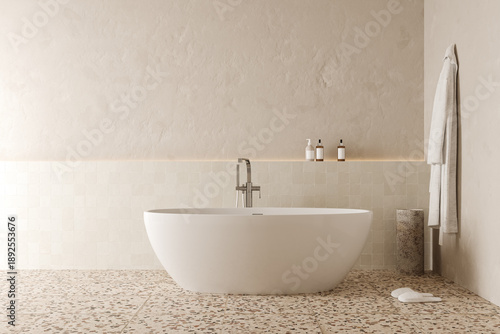 Foto Minimalist bathroom interior with freestanding white bathtub on terrazzo floor a