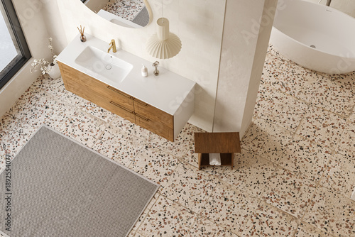 Top view of modern bathroom interior with wooden vanity, terrazzo floor tiles and freestanding bathtub, luxury 3D rendering
