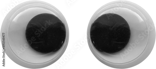 Closeup of googly eyes isolated on white background, plastic toy eyes for craft and DIY