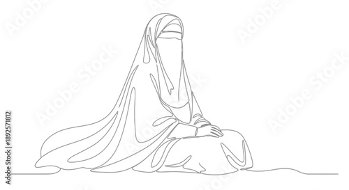 Contemplative woman in traditional Middle Eastern clothing sitting peacefully