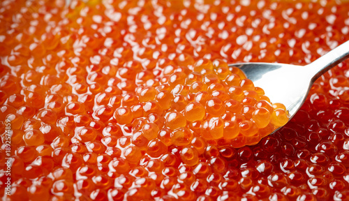 Fresh salmon roe on a spoon