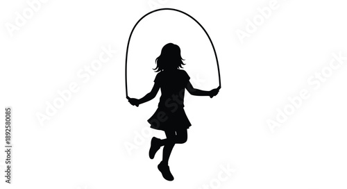 Silhouette of a young girl happily jumping rope outdoors