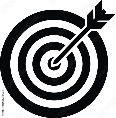 Black and white archery target with arrow in bullseye