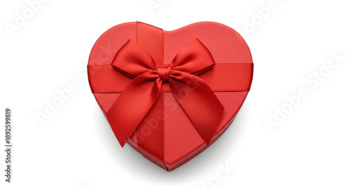 Red heart shaped gift box with a ribbon bow on white background