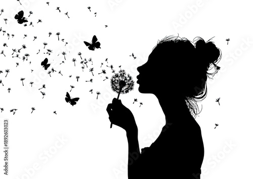 Black silhouette of a woman blowing a dandelion with seeds & butterflies