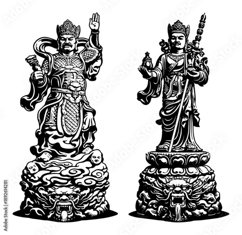 Two detailed statues of oriental deities or guardian warriors standing on decorative pedestals