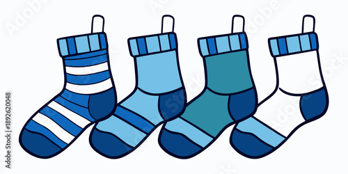 Handmade knitted socks for the cold season. View from above. Many different blue color socks.
