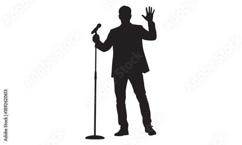 Silhouette of a man in a suit holding a microphone and waving hello.