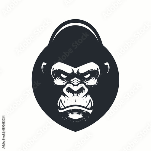 A black and white illustration of a gorilla's face on a shield from a front viewpoint