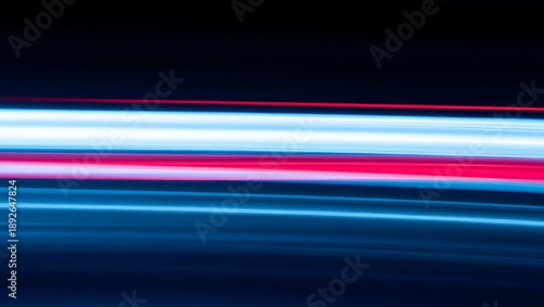 Abstract red and blue motion background with colorful flowing lines and light effects