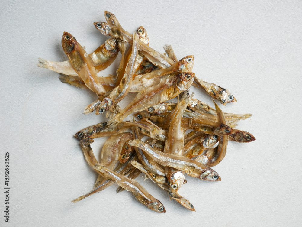 Obraz premium fried anchovies in isolated concept on white background