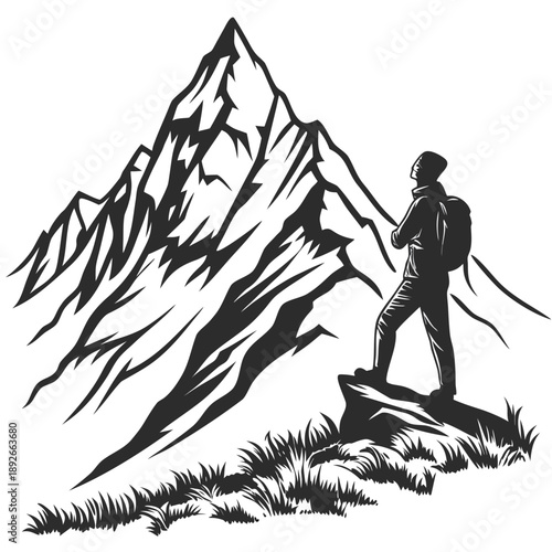 Hiker silhouette standing before a large mountain peak