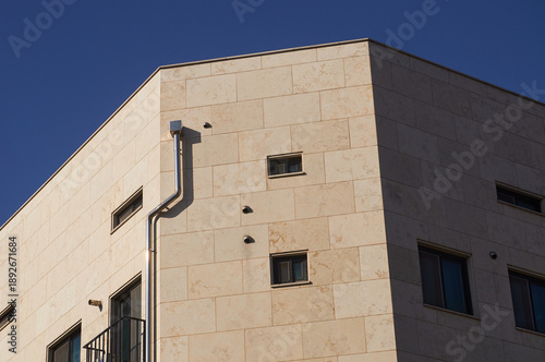 Minimal building corner and blue sky background