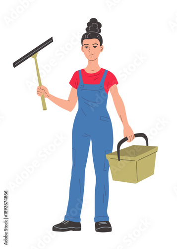 Female window cleaner holding squeegee and bucket