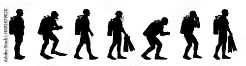 Diver silhouettes with scuba equipment in motion. Professional underwater figures with oxygen tanks