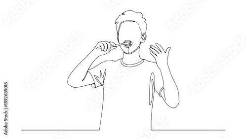 A clean and healthy smile is achieved by a young boy brushing his teeth with a toothbrush and toothpaste