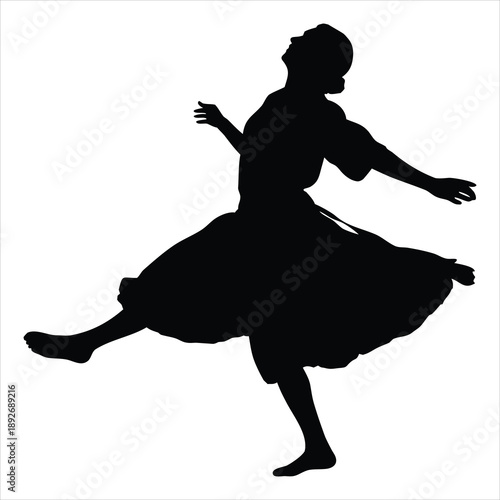 A silhouette of a woman dancing in a flowing dress