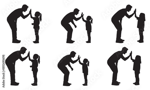 Father and daughter high-fiving, celebrating success and bonding, family moments