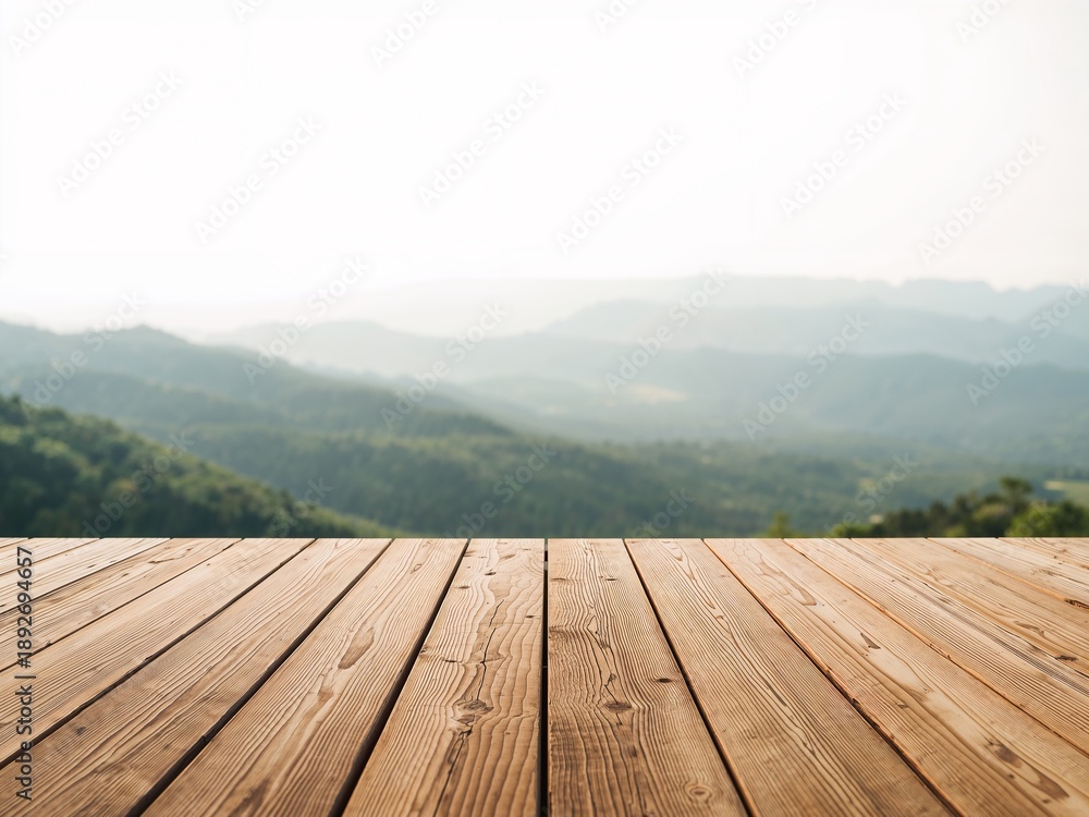 Fototapeta premium Empty wooden table with blurred mountain landscape in the background. Natural outdoor scene with copy space for product display or presentation.