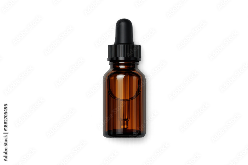 Naklejka premium Amber glass dropper bottle with black cap and clear liquid inside, isolated on black background