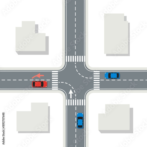 Top View of City Intersection with Cars and Pedestrian Crossings