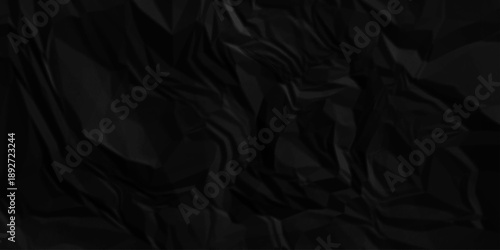 Dark black crumpled paper texture background. black crumpled and top view textures can be used for background of text or any contents.
