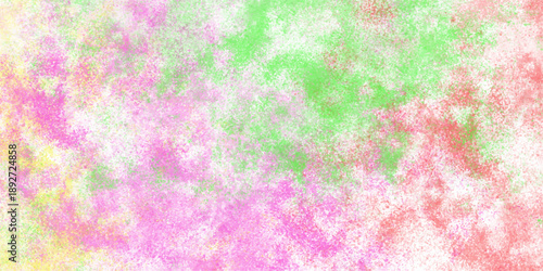 Abstract watercolor paint splatter background with pink green and yellow hues creating a vibrant and textured artistic pattern for design and decoration