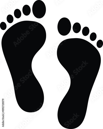 Black human footprints icon representing a pair of walking or standing bare feet