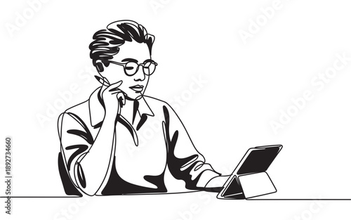 A focused individual in glasses contemplating while working on a digital tablet