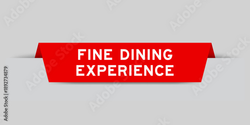 Red color inserted label with word fine dining experience on gray background