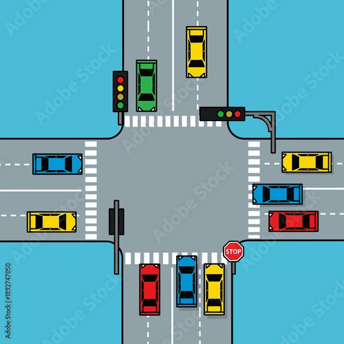 Busy Intersection with Cars, Traffic Lights, and Stop Sign - Aerial View