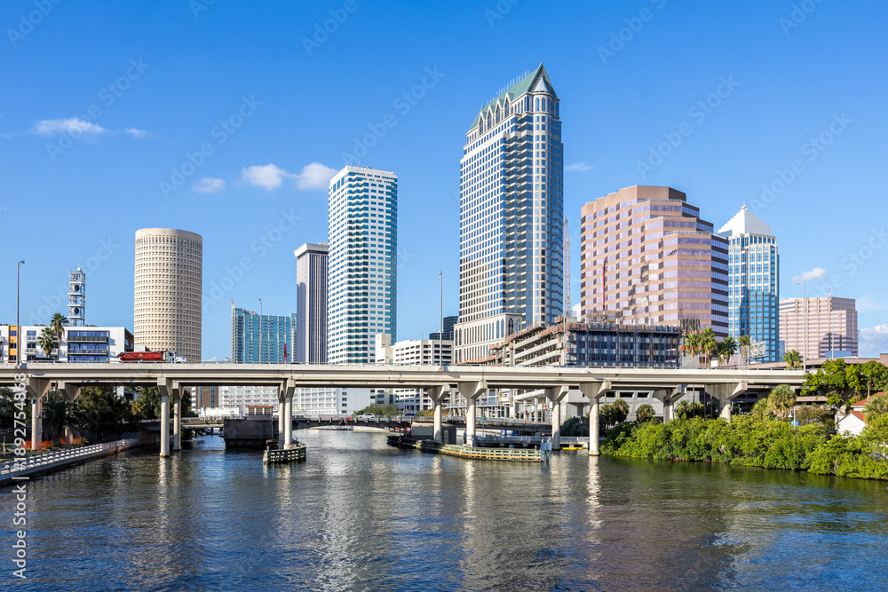 Fototapeta premium Tampa skyline with skyscrapers real estate bridge over Hillsborough River in downtown Tampa, United States